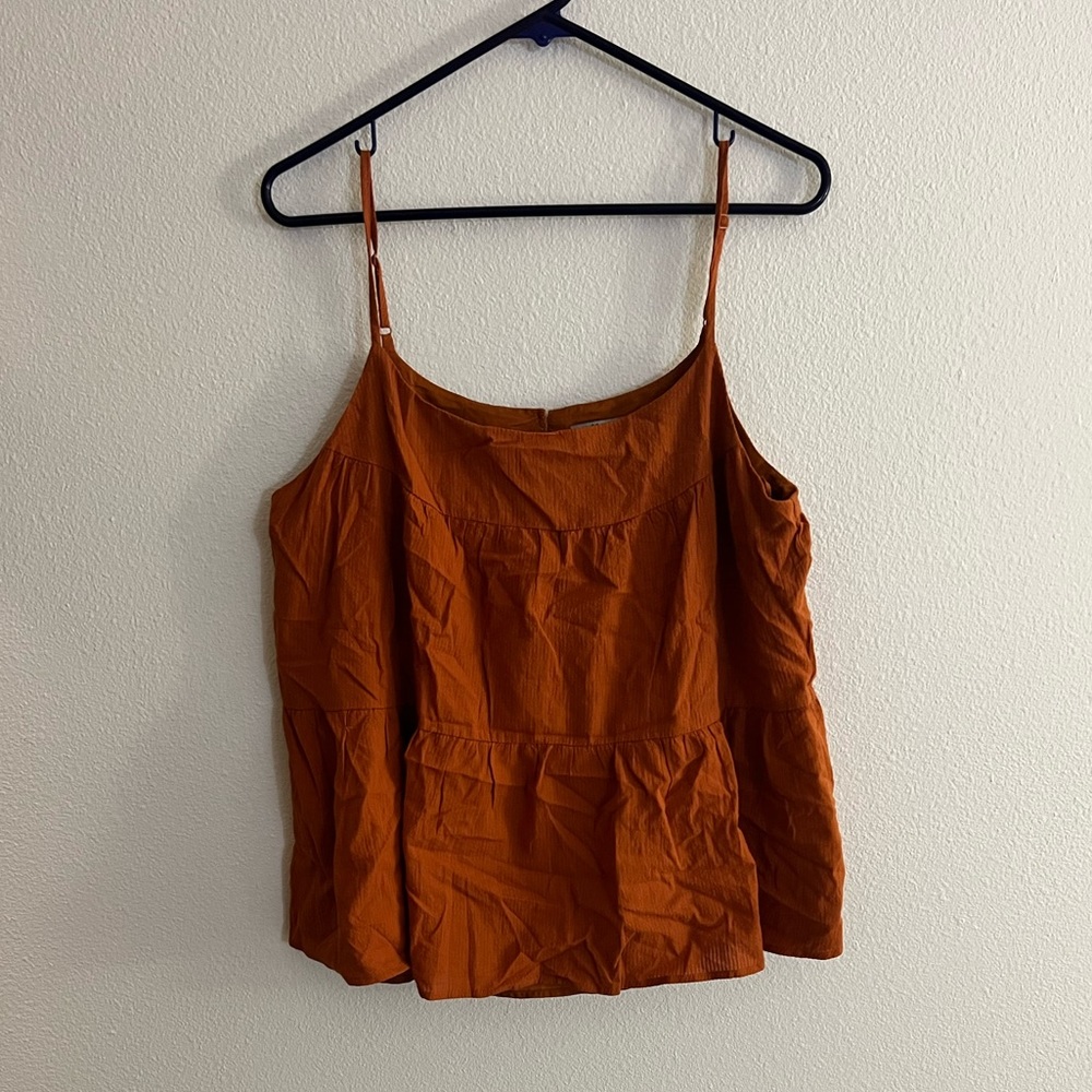 Tired tank top size Large. Orange rust color.